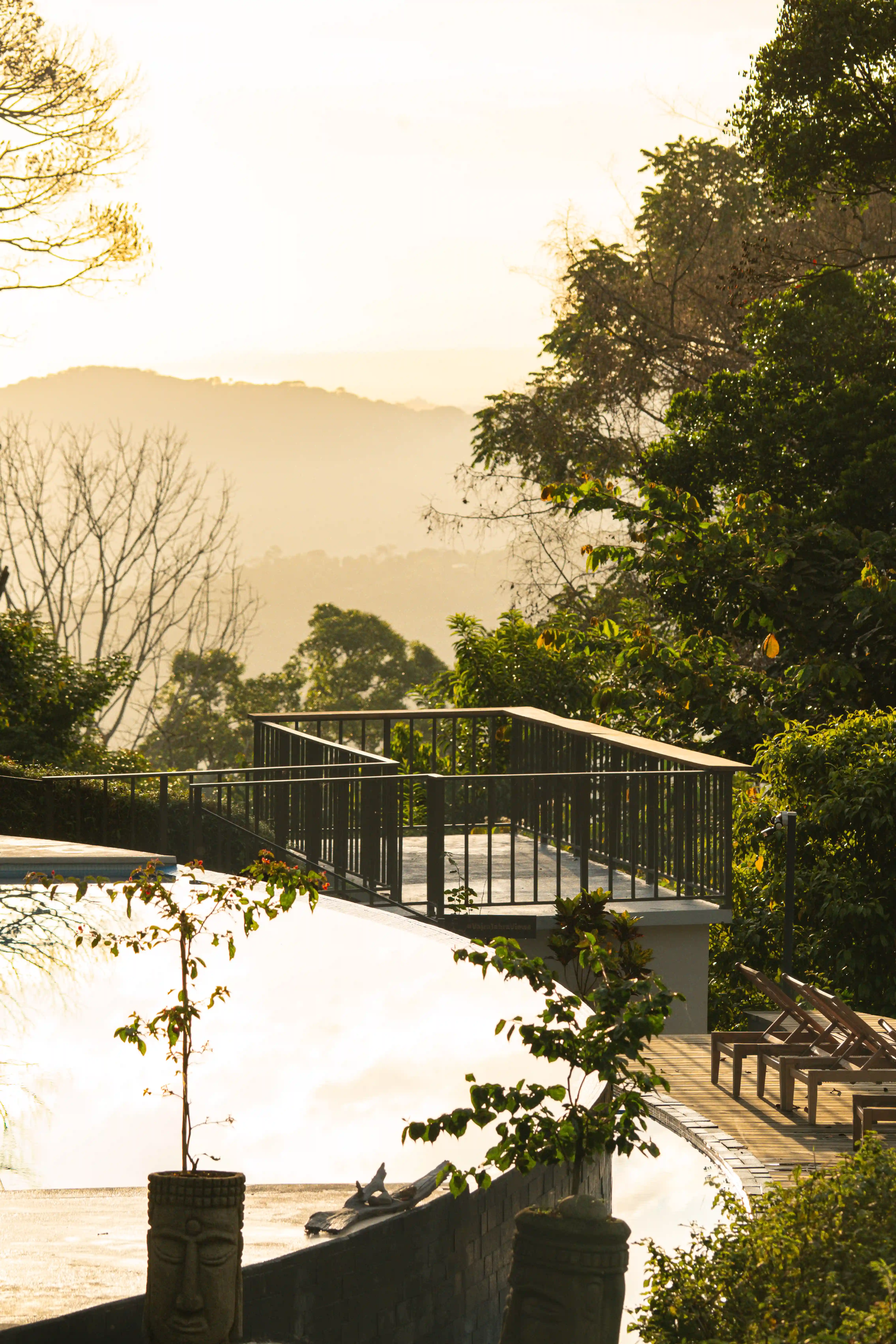 Scenic walkway surrounded by lush greenery at all inclusive villas in Costa Rica.