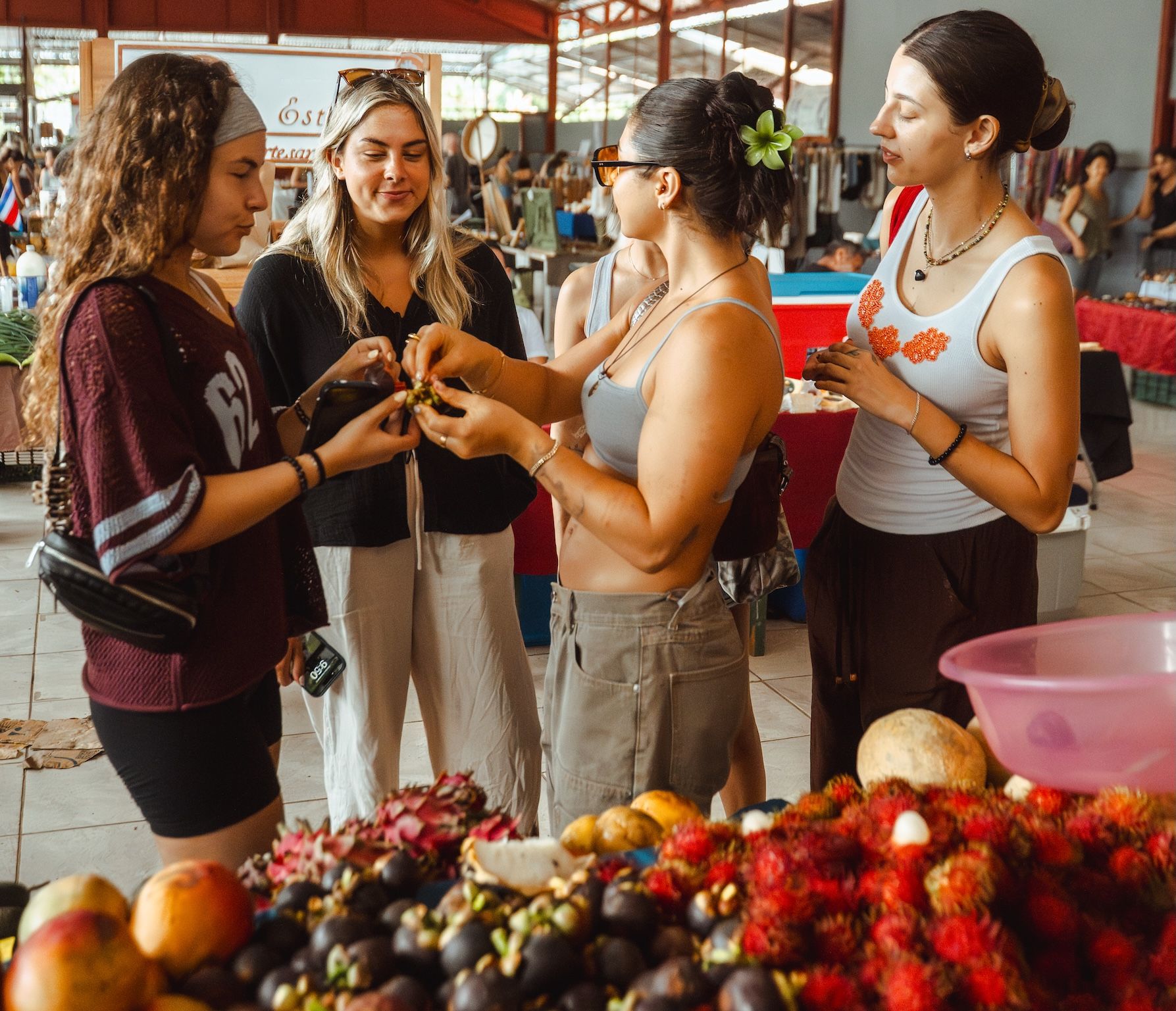 A group of women at a Costa Rica farmer's market. Staying in groups is a Costa Rica safety tip worth remembering.