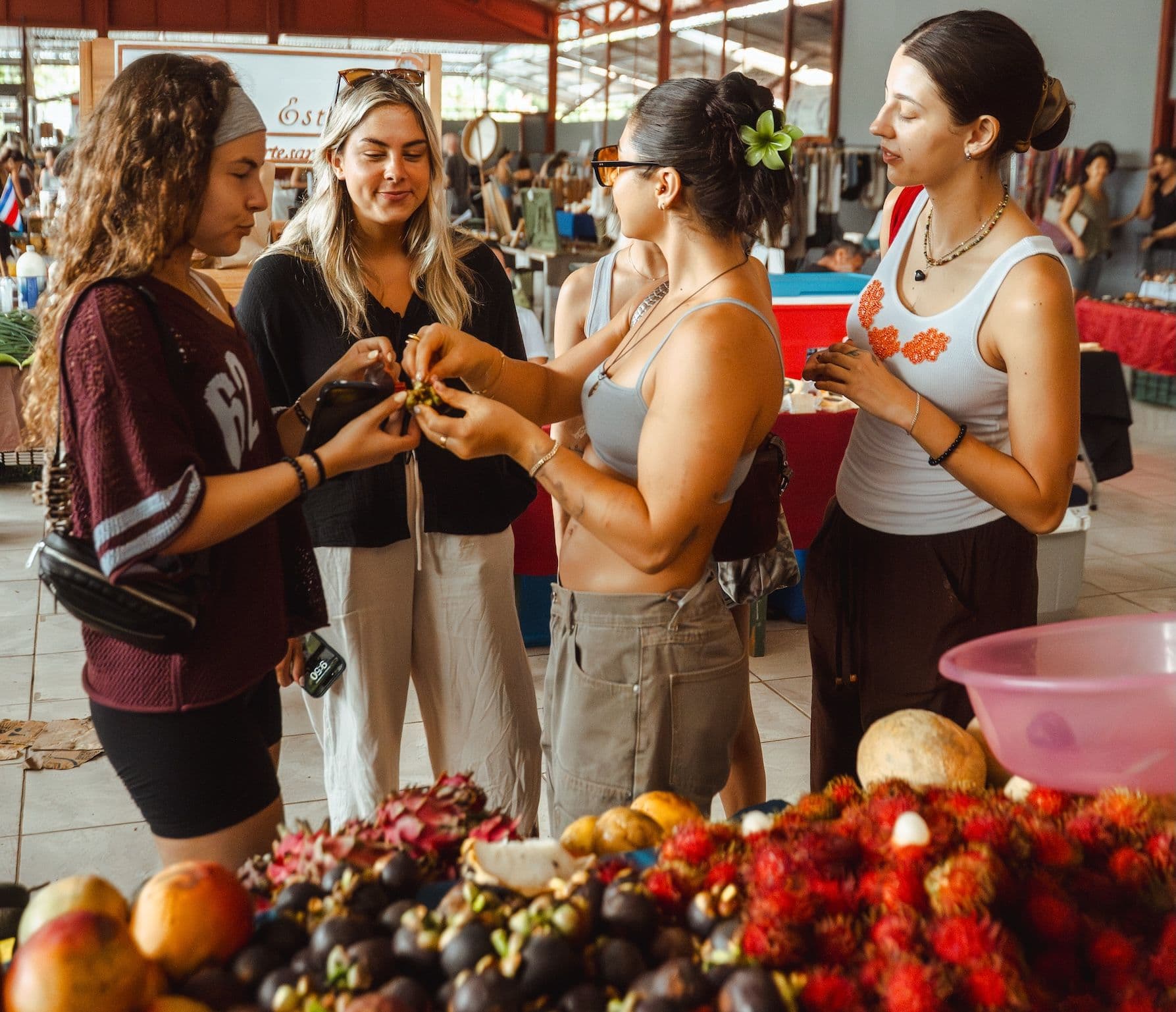 A group of women at a Costa Rica farmer's market. Staying in groups is a Costa Rica safety tip worth remembering.
