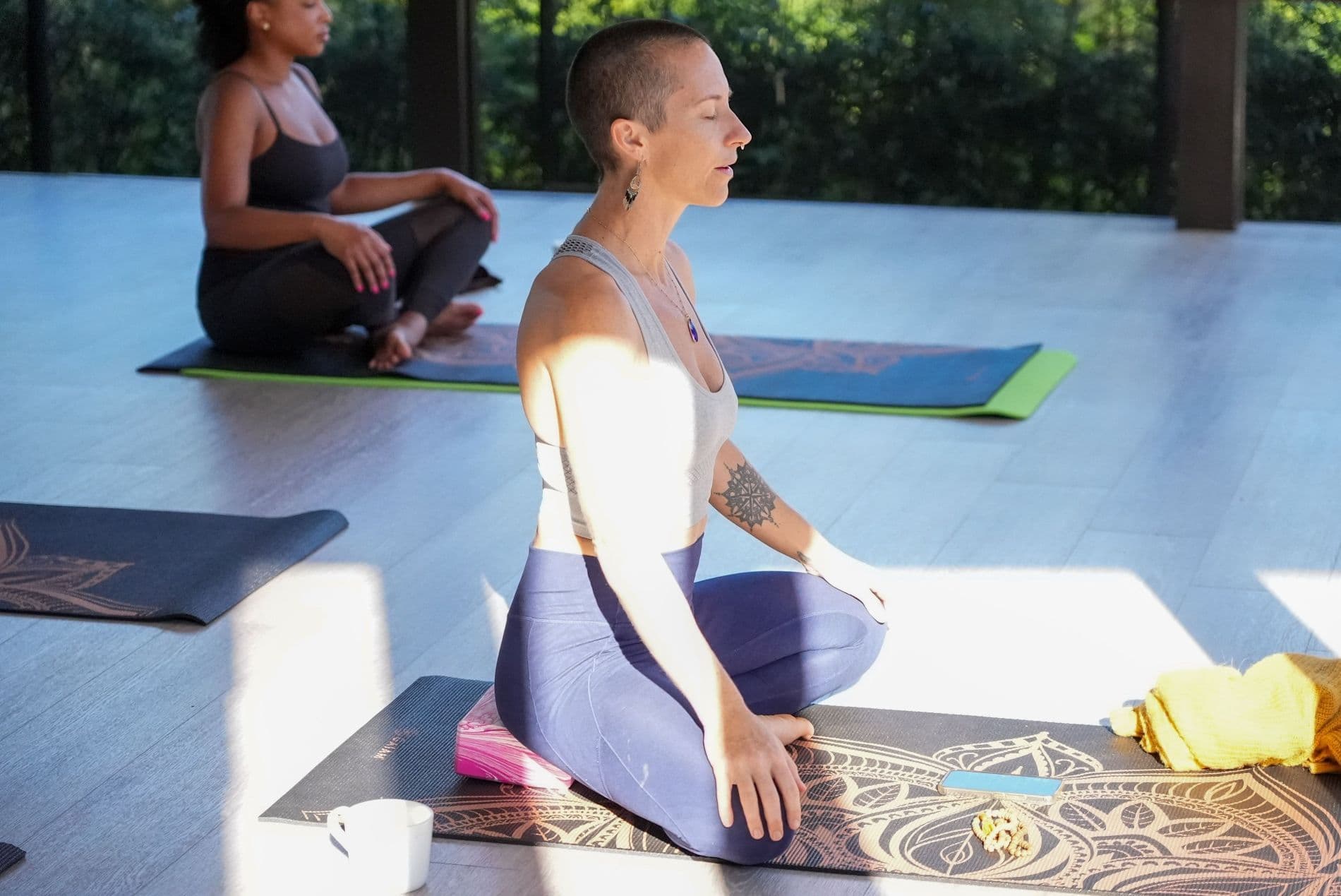 Yogis in a relaxed, grounded, and meditative posture which is conducive to aligning your chakras.