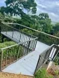 Jungle-view observation deck at Vajra Jahra, a peaceful retreat center in Costa Rica for yoga and wellness.