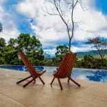 views of the infinity pool overlooking the jungle and waterfall.