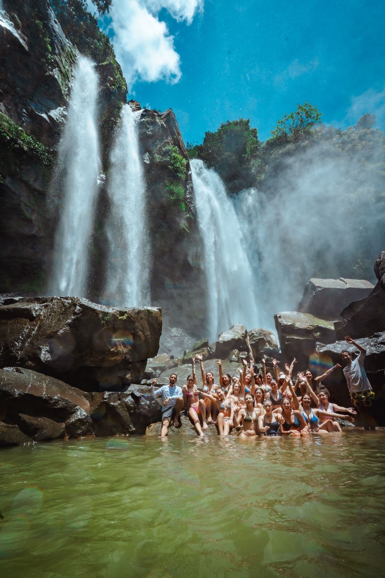 wellness retreat guests at nauyaca waterfall costa rica